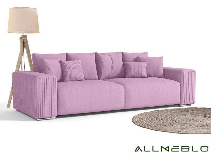 Różowa duża sofa w stylu industrialnym
