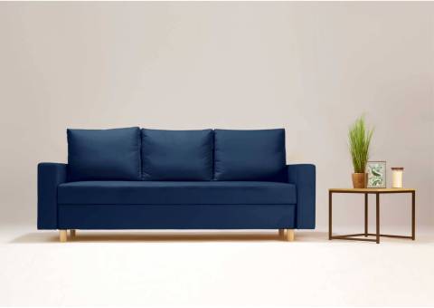 Granatowa sofa na drewnianych nogach