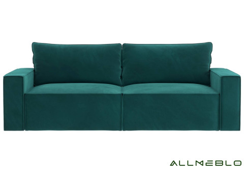 Zielona sofa z przeszyciami