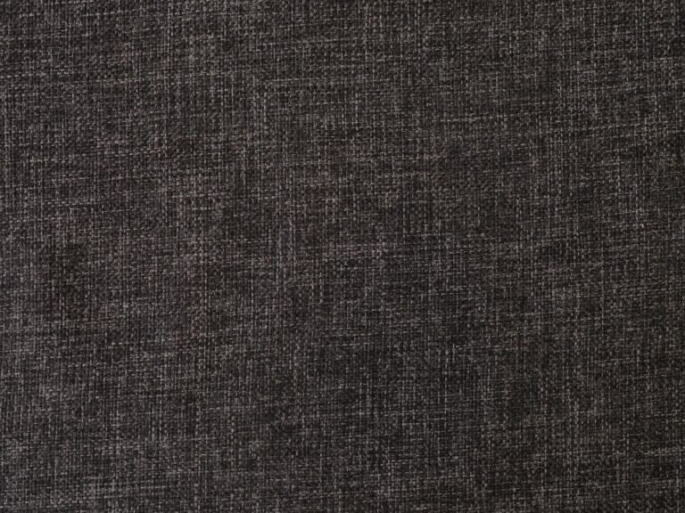 Zbliżenie na ciemną, gęsto tkaną tkaninę tapicerską, widoczny splot grubych nici